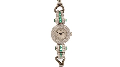 Lot 606 - An Art Deco emerald and diamond cocktail watch