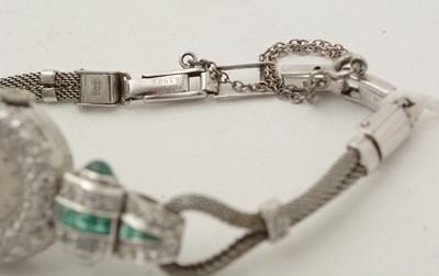 Lot 606 - An Art Deco emerald and diamond cocktail watch