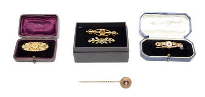 Lot 127 - A selection of Edwardian and style brooches, and a tie pin.