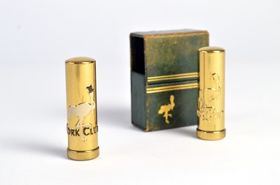 Lot 136 - A 1940s Stork Club cased lipstick set