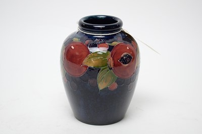 Lot 386 - A Moorcroft ‘Pomegranate’ pattern vase.