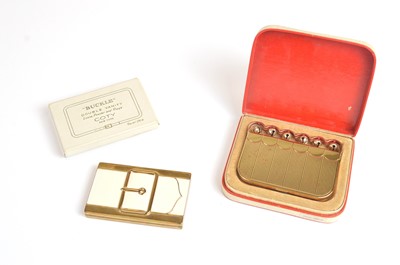 Lot 74 - Coty winter 1942 Christmas highlight compacts "Sleigh Bells" and "Buckle"