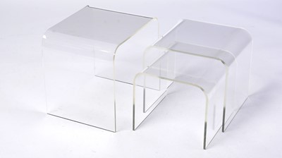Lot 45 - A retro vintage clear acrylic nest of graduating tables