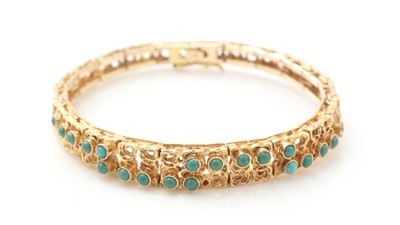 Lot 445 - A 14ct yellow gold and turquoise bracelet