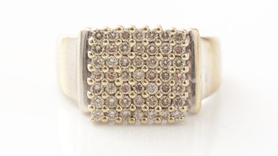 Lot 441 - A gentleman's diamond plaque ring
