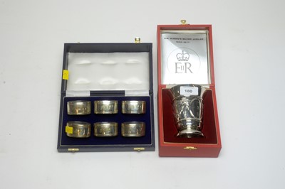 Lot 180 - Silver beaker and napkin rings.