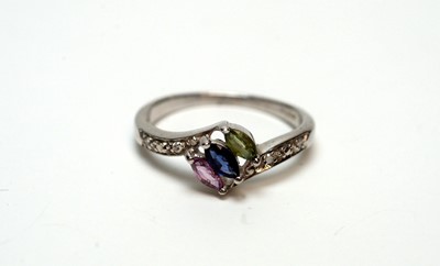 Lot 217 - A blue, pink and green sapphire and diamond ring