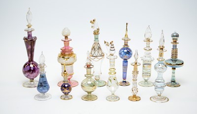 Lot 198 - A collection of Egyptian hand-blown glass perfume bottles