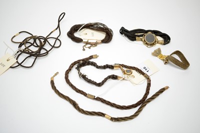 Lot 116 - A collection of 19th Century plaited hair bracelets and necklaces