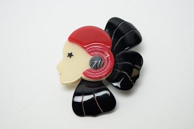 Lot 28 - Lea Stein brooch modelled as a Flapper