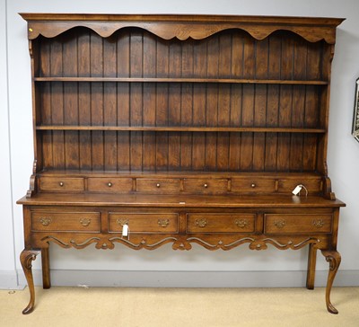 Lot 78 - A large and impressive 18th Century style oak Welsh dresser.