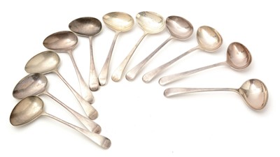 Lot 160 - A set of six Elizabeth II silver soup spoons; and four plated spoons