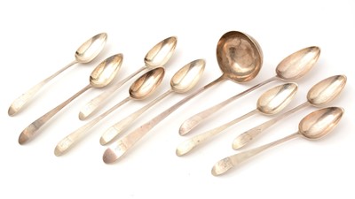 Lot 161 - A George III Irish silver basting spoon; eight Irish silver tablespoons and Irish silver soup ladle