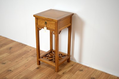 Lot 19 - A 20th Century Chinese oriental hardwood pedestal table.