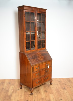 Lot 18 - An early 20th Century mahogany bureau bookcase by Harrods of London