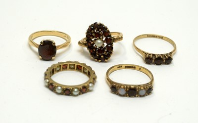 Lot 171 - Five garnet set rings