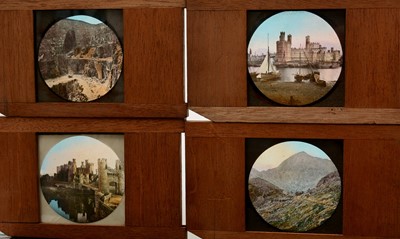 Lot 8 - A collection of 60 early 20th Century mahogany framed coloured Magic Lantern slides