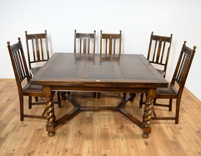Lot 69 - A 20th Century Jacobean revival oak dining suite