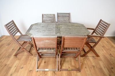 Lot 27 - A Rawlinson Garden Products teak garden table and 8 chairs