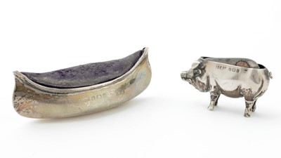 Lot 299 - An Edwardian silver novelty pincushion; and another silver example in the form of a pig