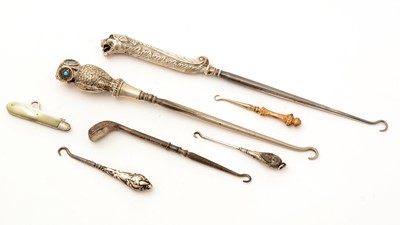 Lot 317 - Selection of button and glove hooks