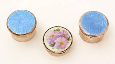 Lot 333 - A George V small silver dressing table pot, a similar pot and a silver circular box