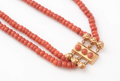 Lot 405 - A two strand coral necklace