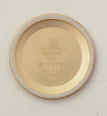 Lot 613 - Patek Philippe, Geneve: an 18ct yellow gold-cased automatic wristwatch