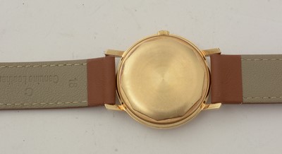 Lot 613 - Patek Philippe, Geneve: an 18ct yellow gold-cased automatic wristwatch