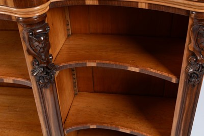 Lot 1343 - Victorian satinwood and coromandel banded serpentine fronted bookcase
