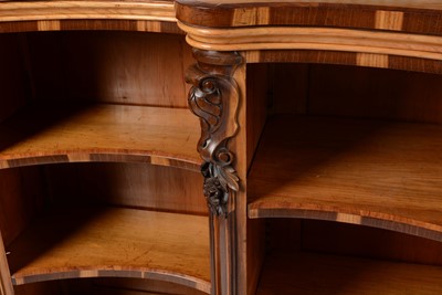 Lot 1343 - Victorian satinwood and coromandel banded serpentine fronted bookcase