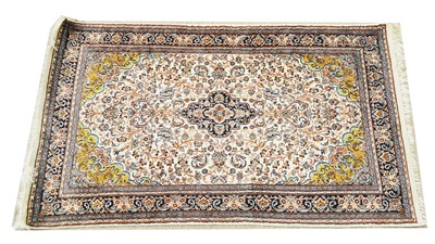 Lot 1162 - A Central Persian silk rug