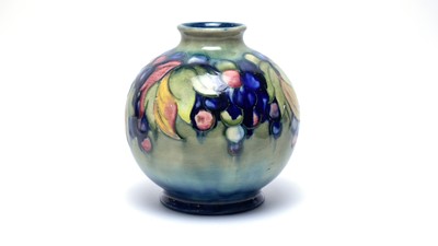 Lot 805 - Walter Moorcroft leaf and berries vase