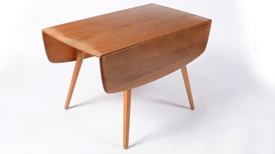 Lot 75A - Ercol - Lucian Ercolani - A retro vintage mid 20th Century Circa 1960s drop leaf dining table