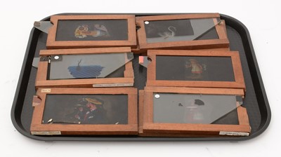 Lot 26 - A collection of early 20th Century handpainted mahogany framed lantern slides