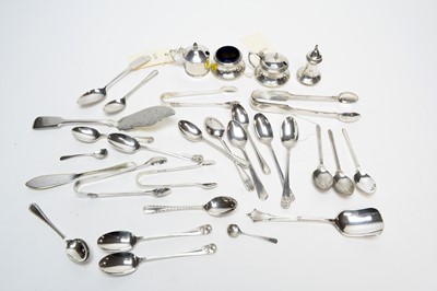 Lot 218 - A selection of silver teaspoons, sugar tongs and condiments and other items