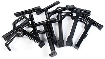 Lot 113 - Seven folding Guitar stands