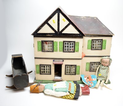 Lot 327 - A Tri-Ang two storey dolls house; together with a selection of dolls and doll accessories