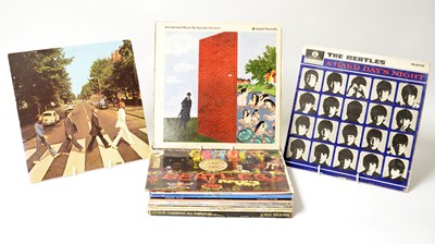 Lot 236 - 16 Beatles and associated LPs