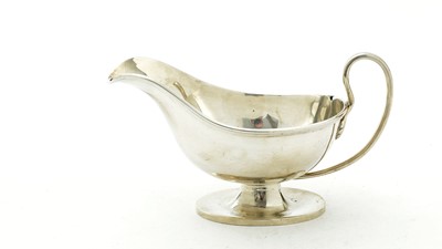 Lot 134 - A silver gravy or sauce boat