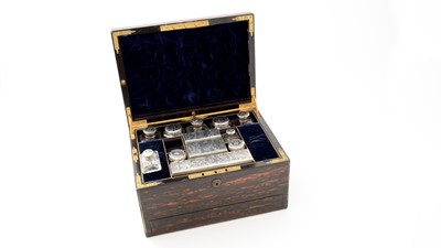 Lot 121 - A Victorian brass bound coromandel Wood toilet box