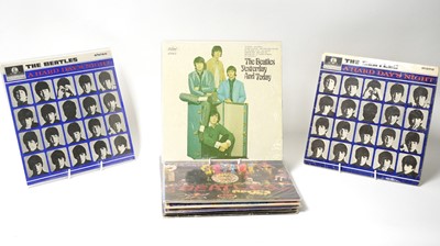 Lot 317 - 12 Beatles and associated LPs
