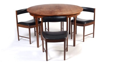 Lot 30 - After Frem Rojle: a mid-Century teak extending dining table and chairs