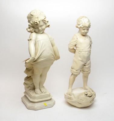 Lot 227 - An alabaster style plaster figure of a boy with frog