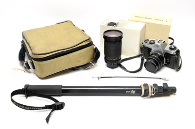 Lot 805 - A Pentax Spotmatic F camera fitted a Takumar...