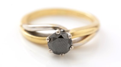 Lot 158 - A solitaire black diamond ring
