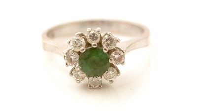 Lot 448 - A tourmaline and diamond cluster ring