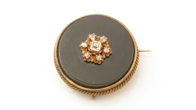 Lot 155 - A Continental 19th Century onyx and diamond brooch