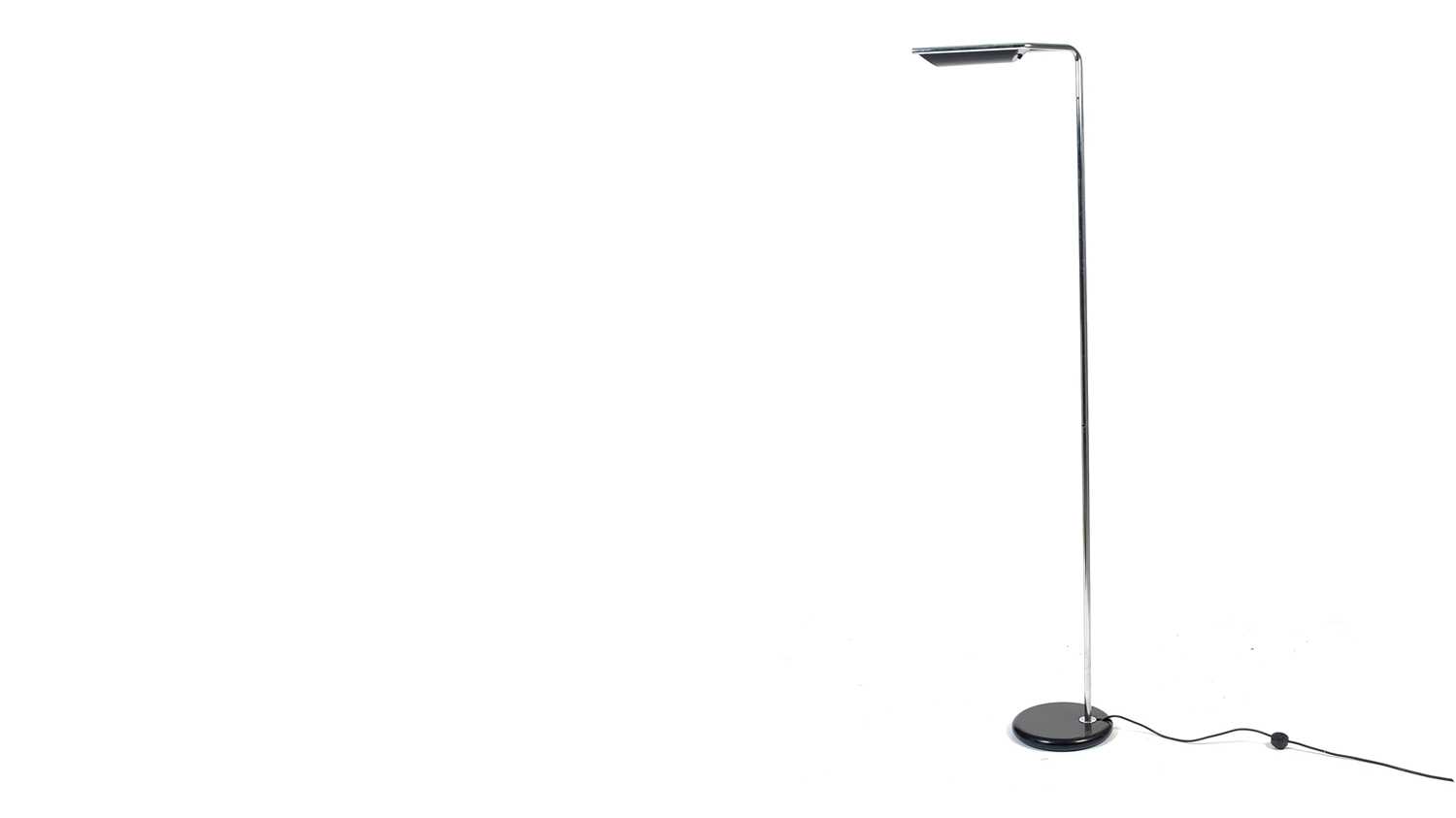 Lot 55 - After Harvey Guzzini: A mid-Century chrome and glass uplighter standard lamp