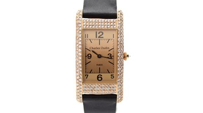Lot 538 - Charles Oudin, Paris: an 18ct yellow gold and diamond-cased quartz wristwatch